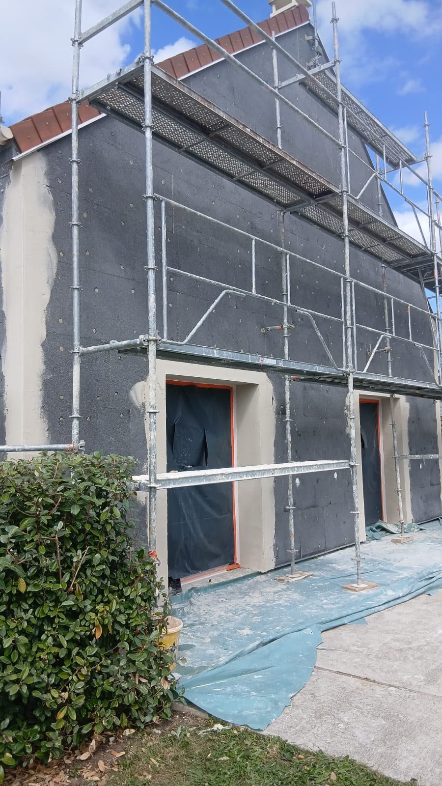 Fixation des panneaux isolants en façade - ITE PSE sur brique Rosny-sur-Seine